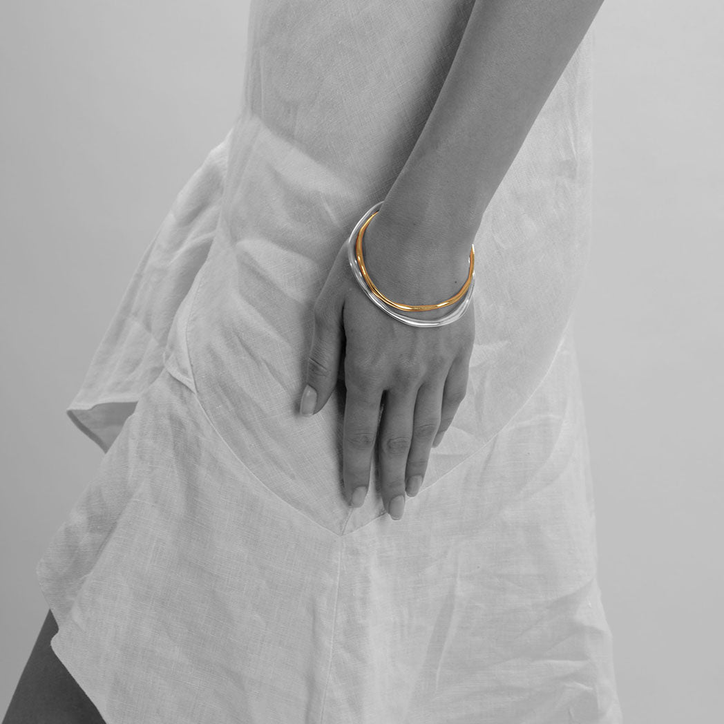 organic style shape modern bangle in silver and gold plated silver.handmade minimalist bangle