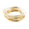 handmade ethical jewellery. organic styled thick bangle in silver and gold plated silver.  Edit alt text