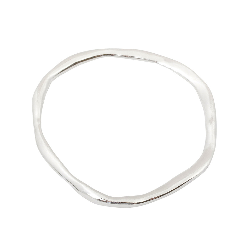 handmade contemporary organic shaped bangle in starling silver.made in london.  Edit alt text